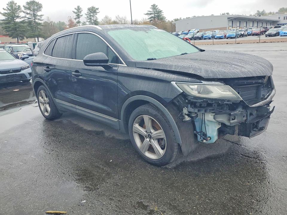 Photo 4 from auction – 2015 LINCOLN MKC with VIN 5LMCJ2A99FUJ04998
