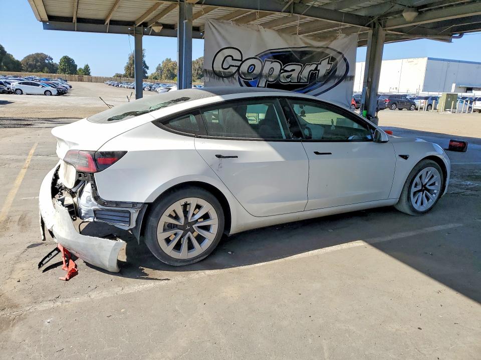 Photo 3 from auction – 2023 TESLA MODEL 3 with VIN 5YJ3E1EA8PF573648