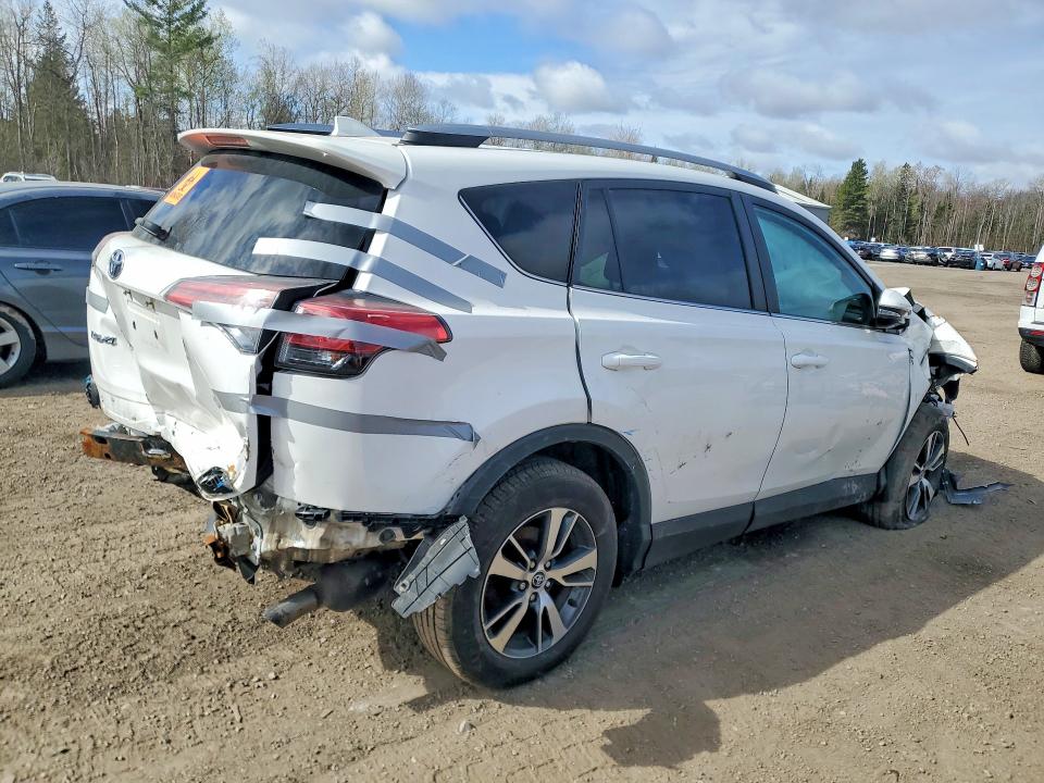 Photo 3 from auction – 2018 TOYOTA RAV4 with VIN 2T3ZFREV2JW469621