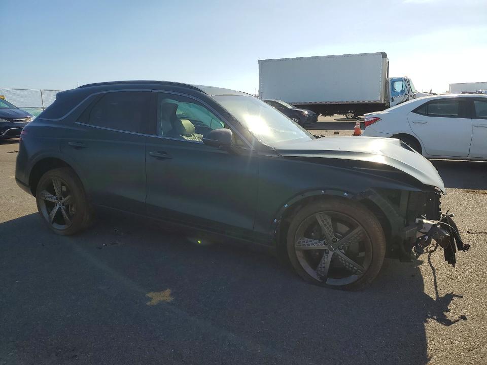 Photo 4 from auction – 2022 GENESIS GV70 with VIN KMUMCDTC3NU038468