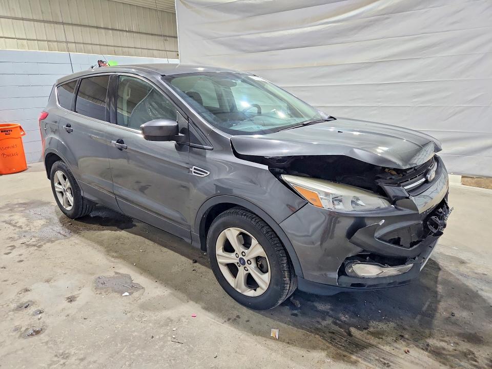 Photo 4 from auction – 2015 FORD ESCAPE with VIN 1FMCU9GX7FUB53979