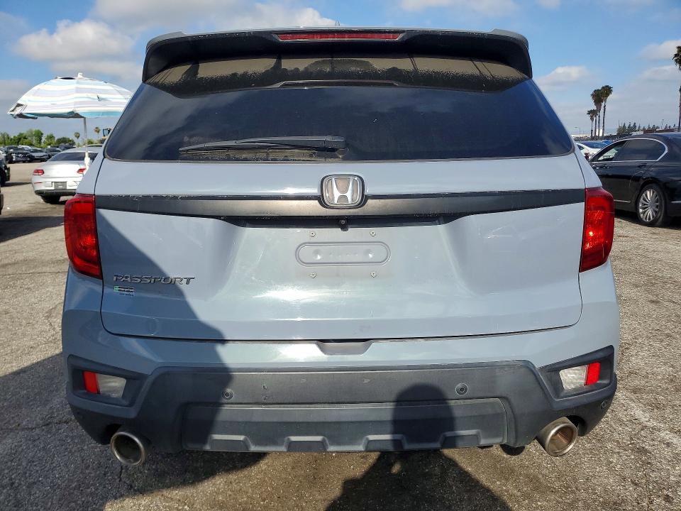 Photo 6 from auction – 2022 HONDA PASSPORT with VIN 5FNYF7H55NB002765