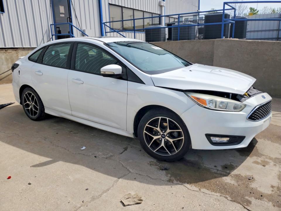 Photo 4 from auction – 2016 FORD FOCUS with VIN 1FADP3F26GL224234