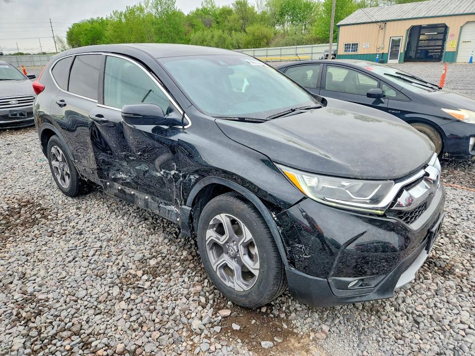 Photo 4 from auction – 2018 HONDA CR-V with VIN 7FARW2H56JE045176
