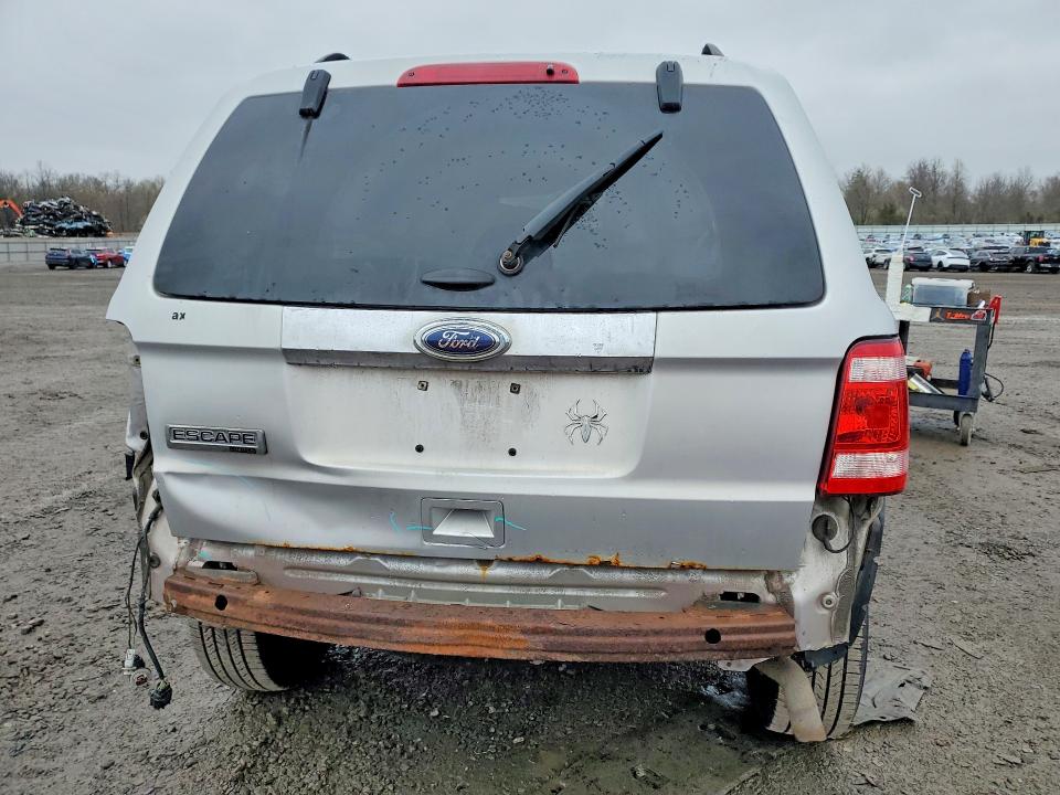 Photo 6 from auction – 2011 FORD ESCAPE with VIN 1FMCU0E70BKB17717