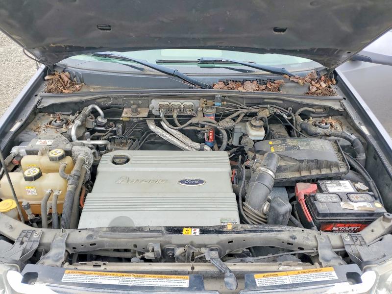Foto 12 de la subasta – 2008 FORD ESCAPE con VIN 1FMCU49H78KA61665