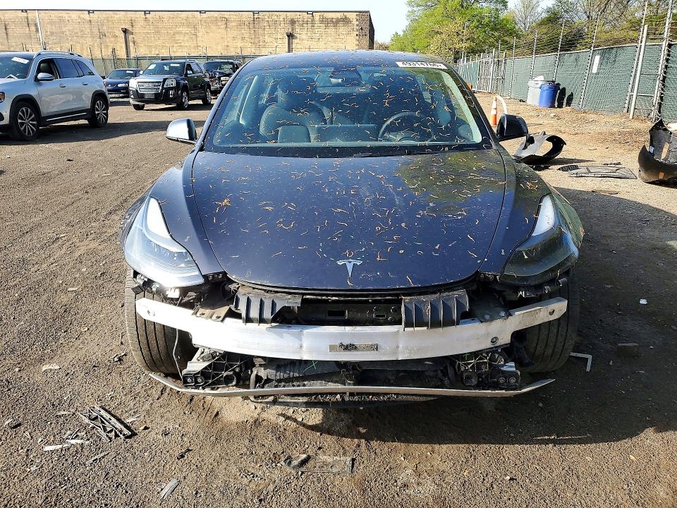Photo 5 from auction – 2023 TESLA MODEL 3 with VIN 5YJ3E1EA8PF408800