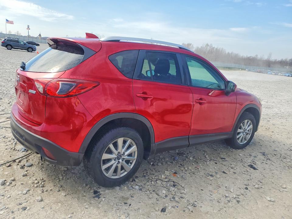Photo 3 from auction – 2015 MAZDA CX-5 with VIN JM3KE2CY0F0448794
