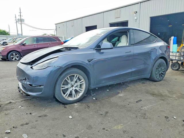 TESLA MODEL Y 2023 с VIN 7SAYGAEE0PF956960 - Фото с аукциона