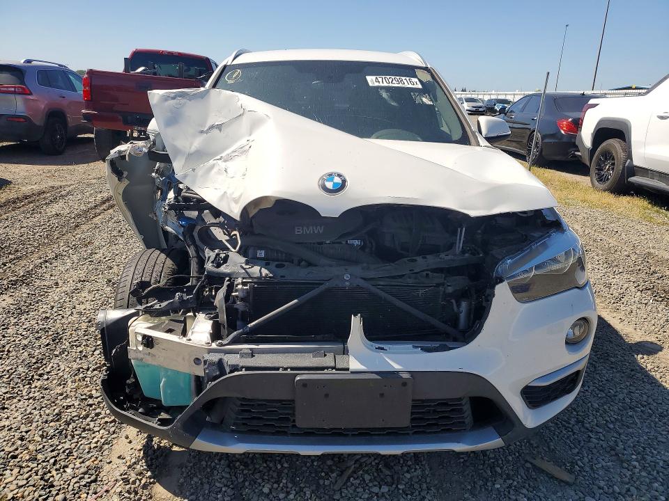 Photo 5 from auction – 2018 BMW X1 with VIN WBXHU7C34J5H40120