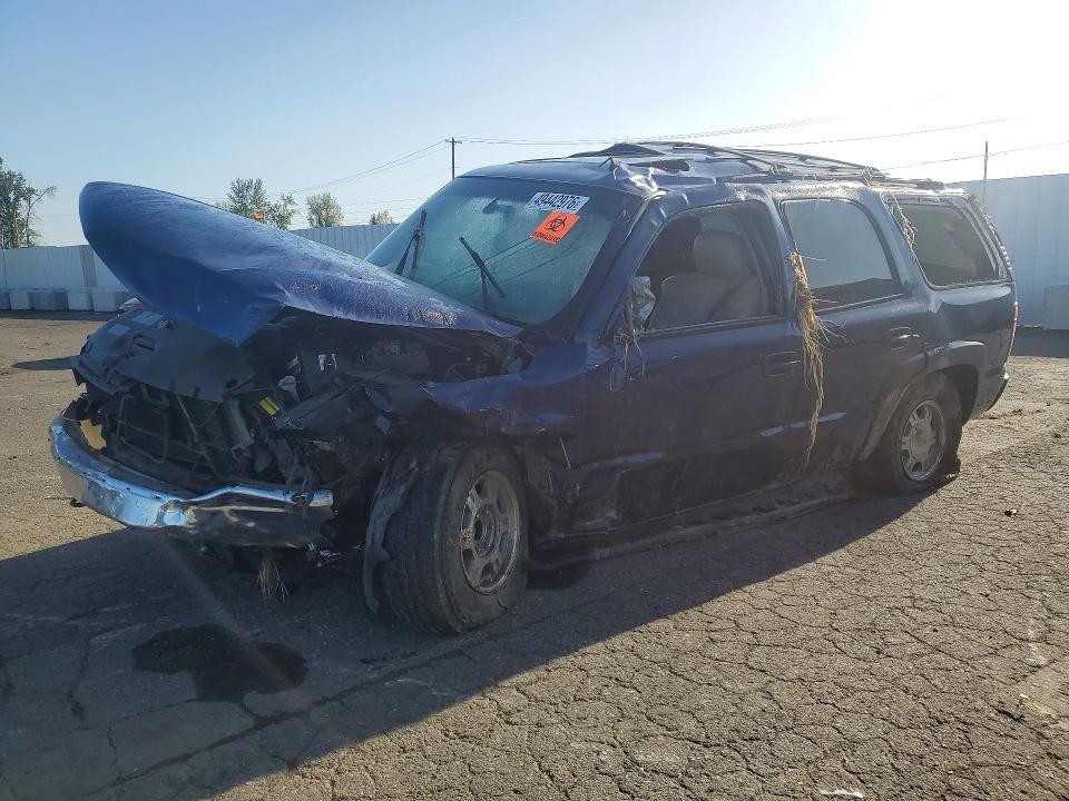 GMC YUKON 2002 with VIN 1GKEK13Z22R140036 - Photo from auction