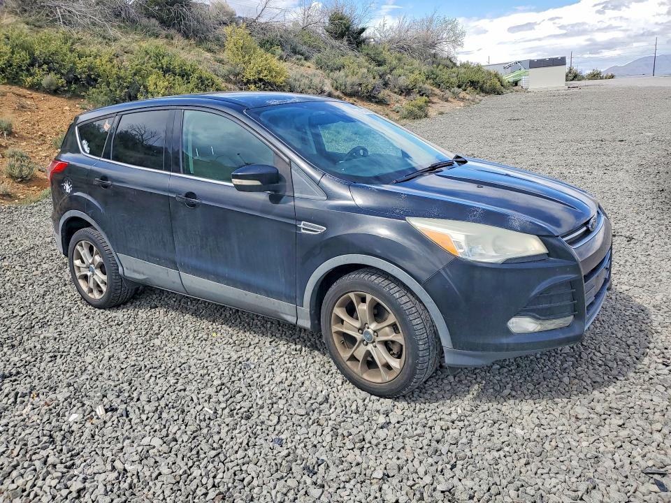 Photo 4 from auction – 2013 FORD ESCAPE with VIN 1FMCU9HXXDUB72005