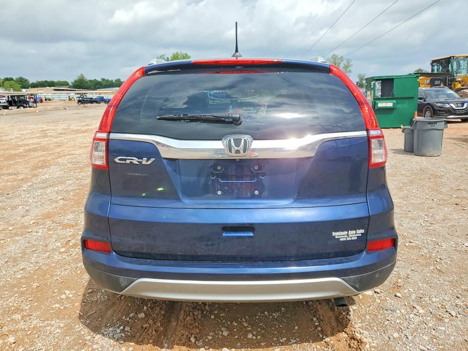 Photo 6 from auction – 2015 HONDA CR-V with VIN 2HKRM3H77FH555375