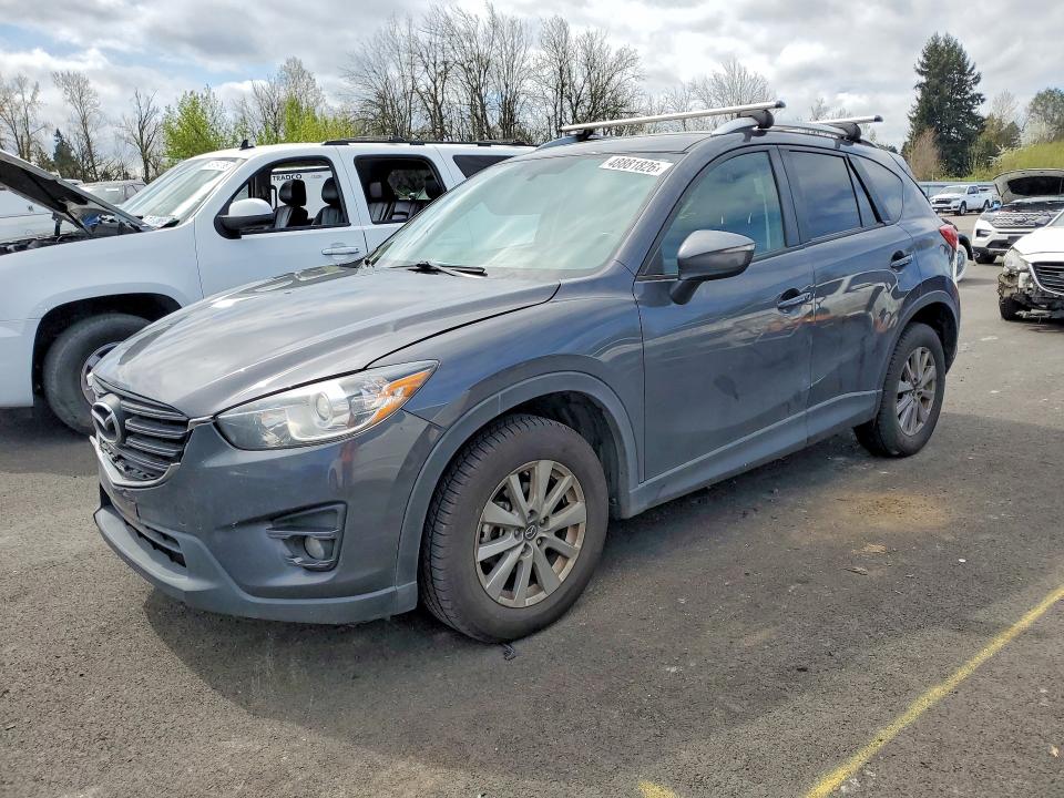 MAZDA CX-5 2016 with VIN JM3KE2CY0G0876821 - Photo from auction