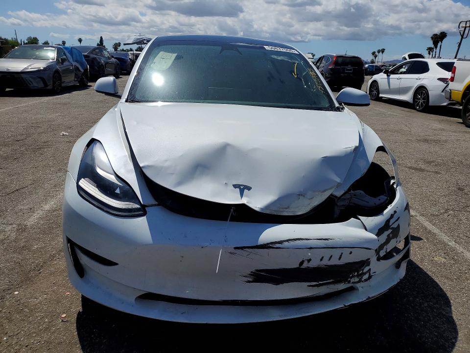 Photo 5 from auction – 2021 TESLA MODEL 3 with VIN 5YJ3E1EB0MF015555
