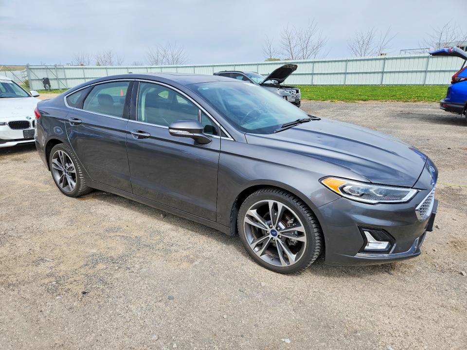 Снимка 4 от търг – 2020 FORD FUSION с VIN 3FA6P0D93LR152153