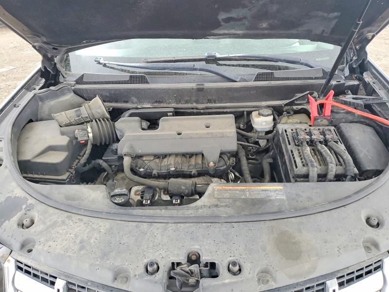 Photo 11 from auction – 2014 CADILLAC SRX with VIN 3GYFNBE39ES657366