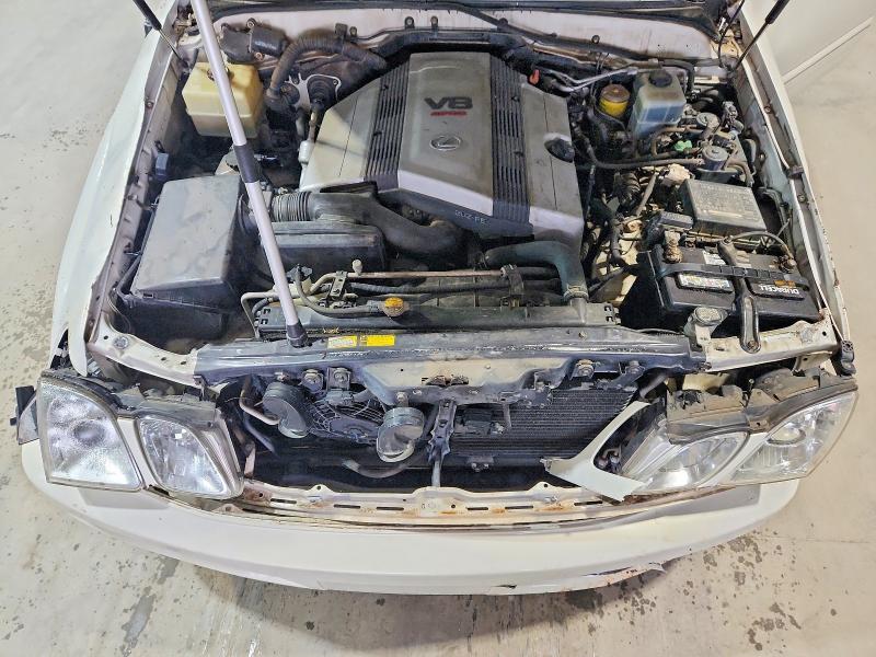 Photo 12 from auction – 2000 LEXUS LX with VIN JT6HT00WXY0125735