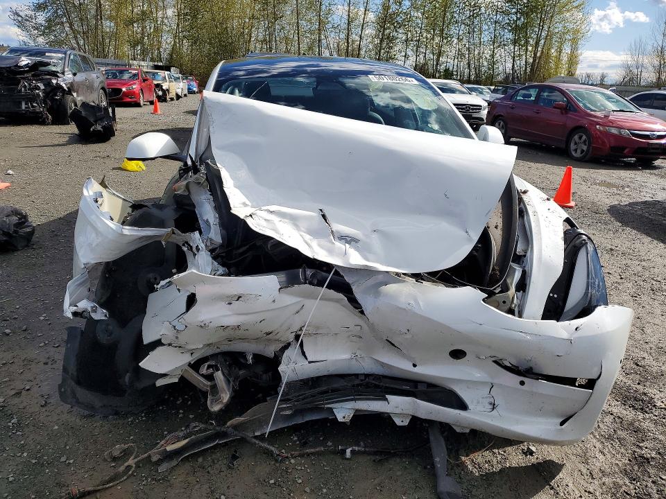 Фото 5 с аукциона – 2021 TESLA MODEL 3 с VIN 5YJ3E1EAXMF053138