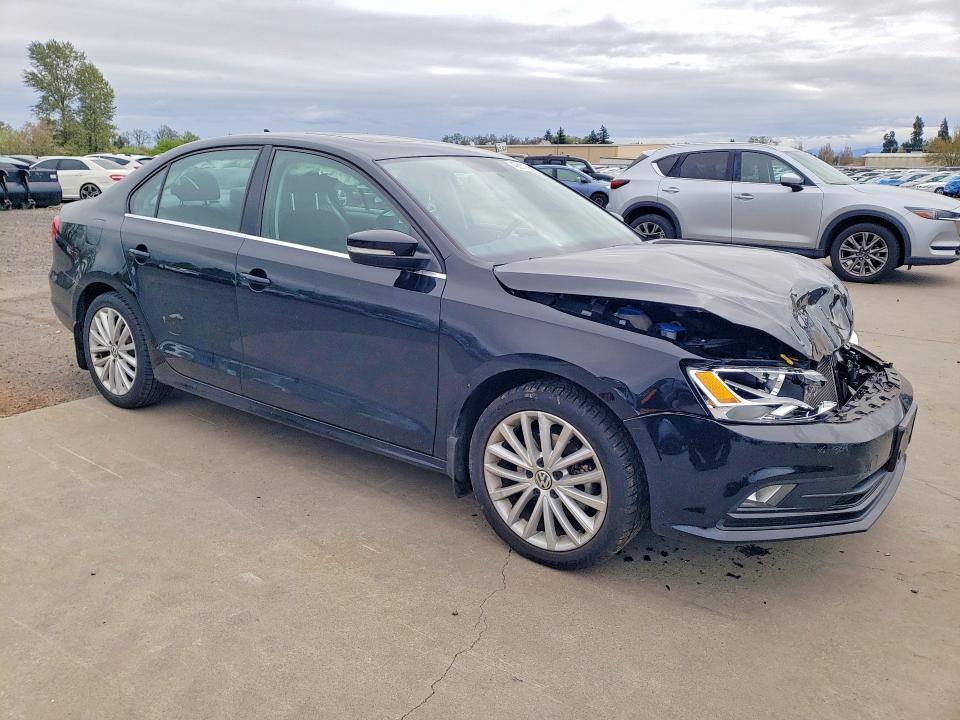 Photo 4 from auction – 2015 VOLKSWAGEN JETTA with VIN 3VWD17AJ5FM316852