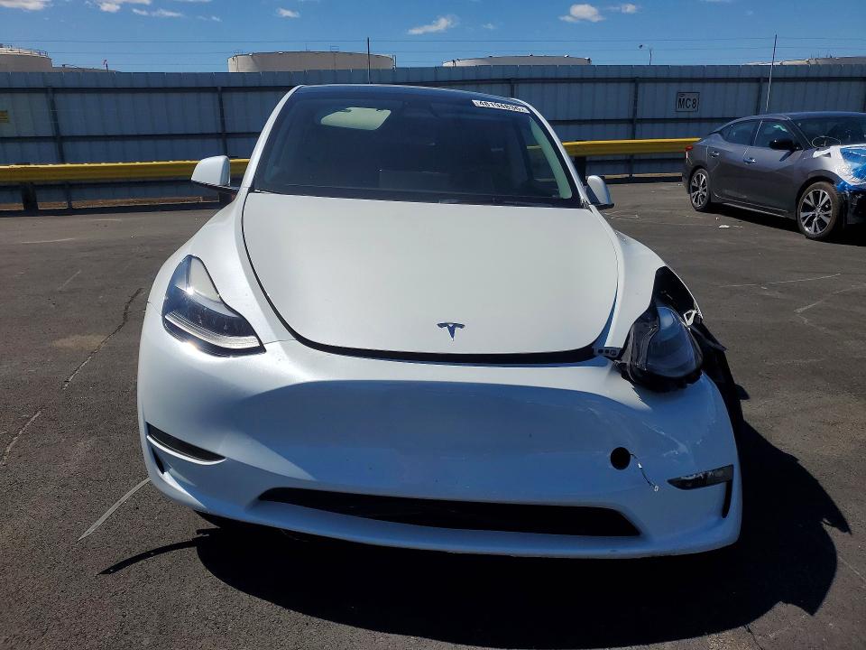 Photo 5 from auction – 2023 TESLA MODEL Y with VIN 7SAYGAEE4PF903114