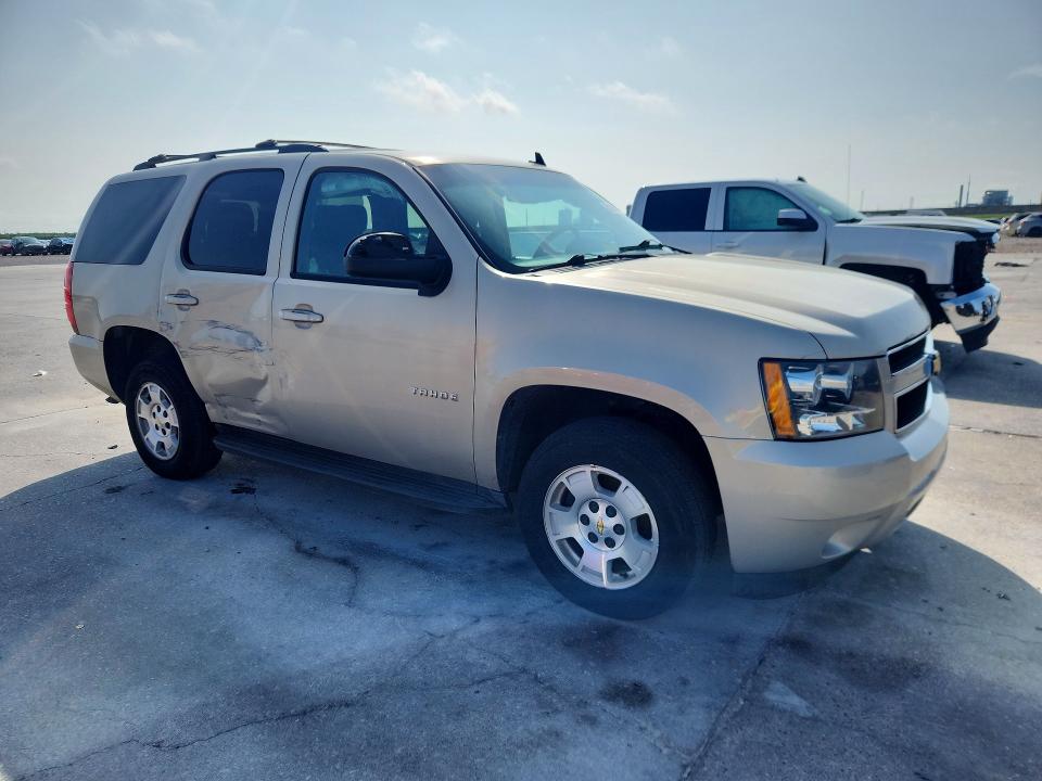Photo 4 from auction – 2011 CHEVROLET TAHOE with VIN 1GNSCAE02BR144685