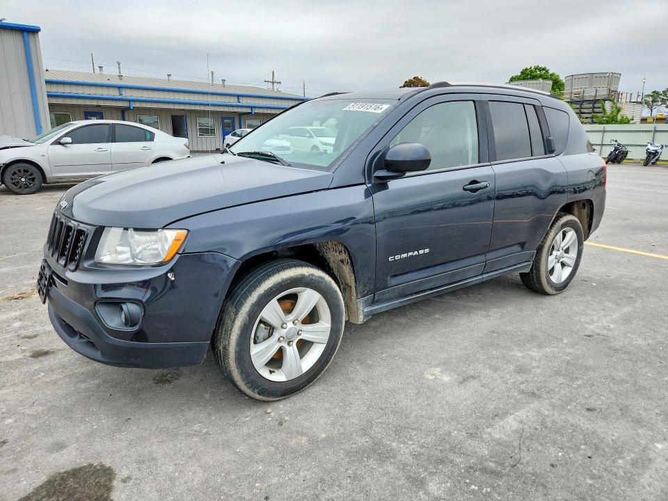 JEEP COMPASS 2014 with VIN 1C4NJCBA8ED725663 - Photo from auction