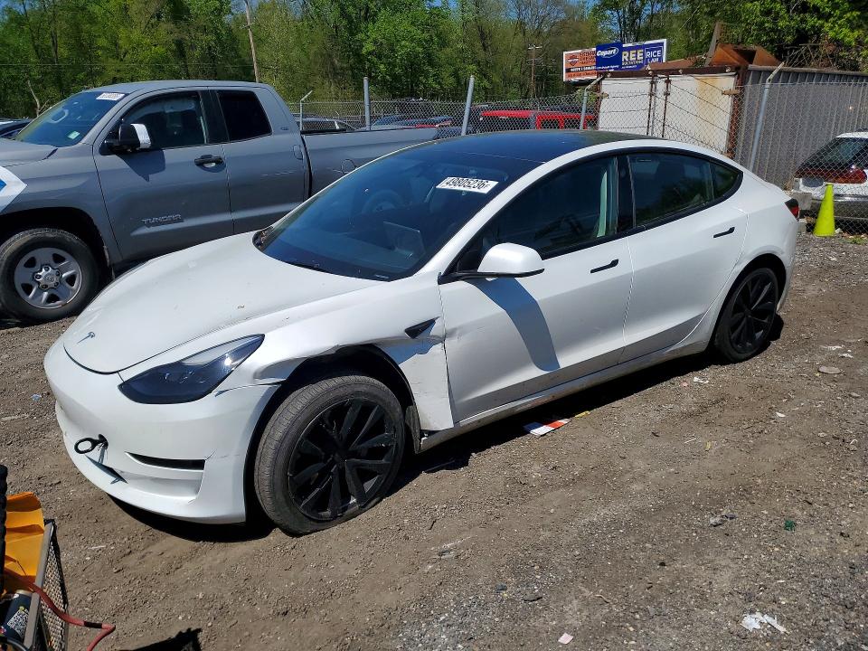 TESLA 3 2023 with VIN 5YJ3E1EA2PF556697 - Photo from auction