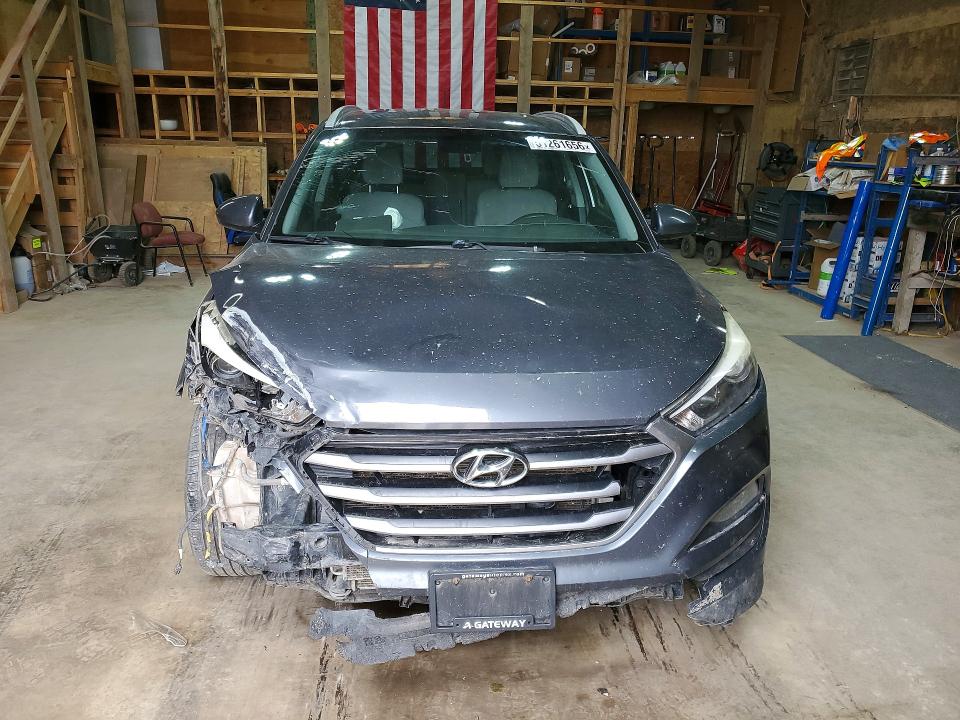 Photo 5 from auction – 2017 HYUNDAI TUCSON with VIN KM8J3CA41HU567428