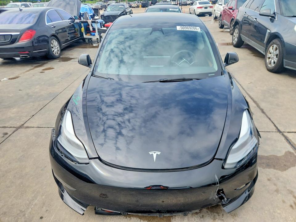 Photo 5 from auction – 2023 TESLA MODEL 3 with VIN 5YJ3E1EA8PF681879