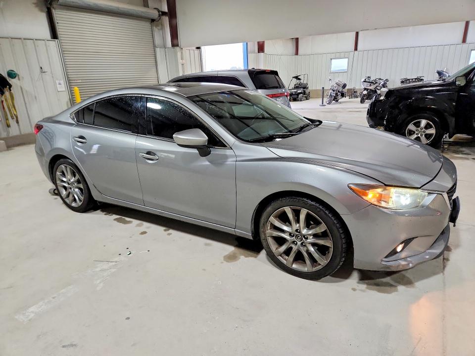 Photo 4 from auction – 2014 MAZDA 6 with VIN JM1GJ1W5XE1112343