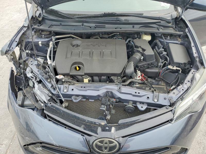 Photo 11 from auction – 2018 TOYOTA COROLLA with VIN 5YFBURHEXJP745640
