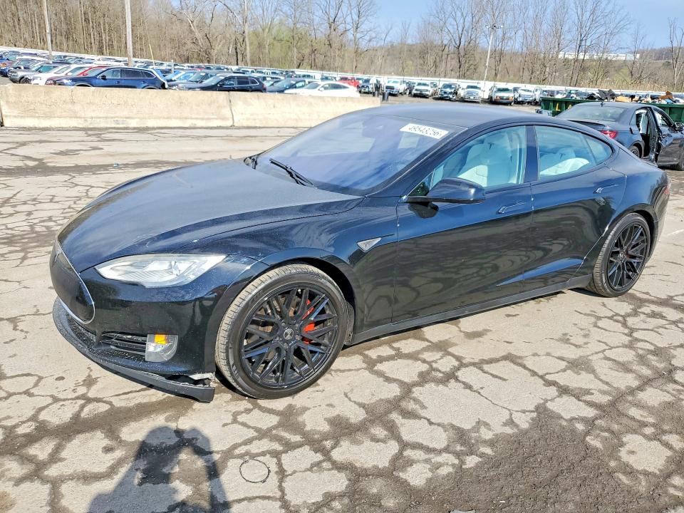 TESLA MODEL S 2014 with VIN 5YJSA1H13EFP51188 - Photo from auction