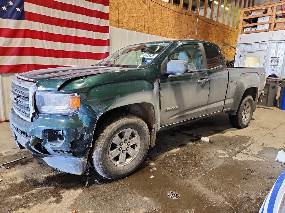 GMC CANYON 2015 with VIN 1GTH6AE35F1191556 - Photo from auction