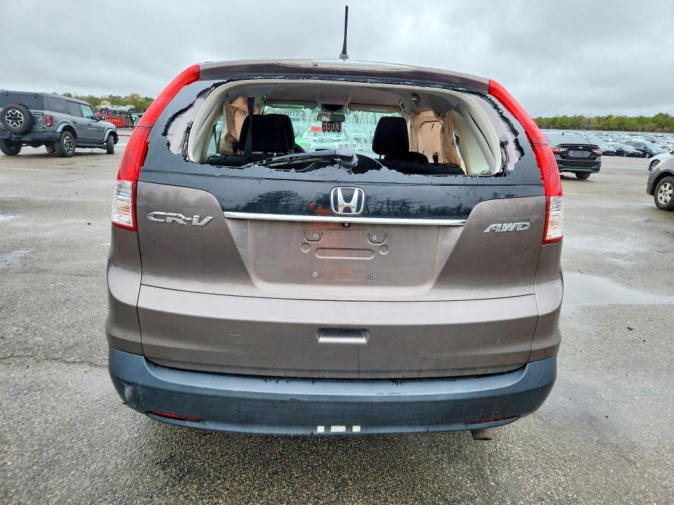 Photo 6 from auction – 2014 HONDA CR-V with VIN 2HKRM4H32EH684254
