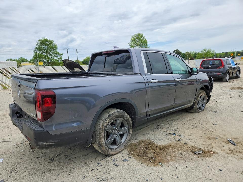 Photo 3 from auction – 2023 HONDA RIDGELINE with VIN 5FPYK3F78PB043412