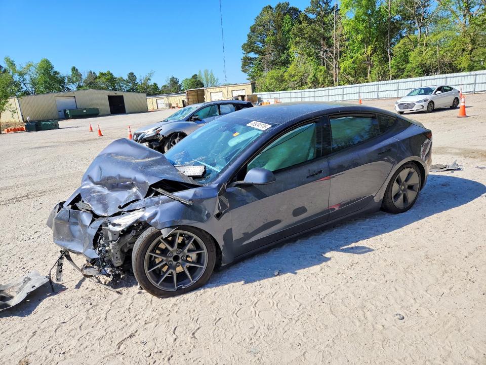 TESLA MODEL 3 2023 with VIN 5YJ3E1EA0PF580996 - Photo from auction