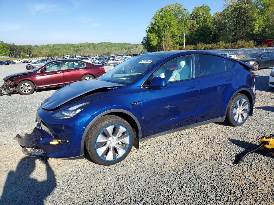TESLA MODEL Y 2023 with VIN 7SAYGDEE9PF584231 - Photo from auction