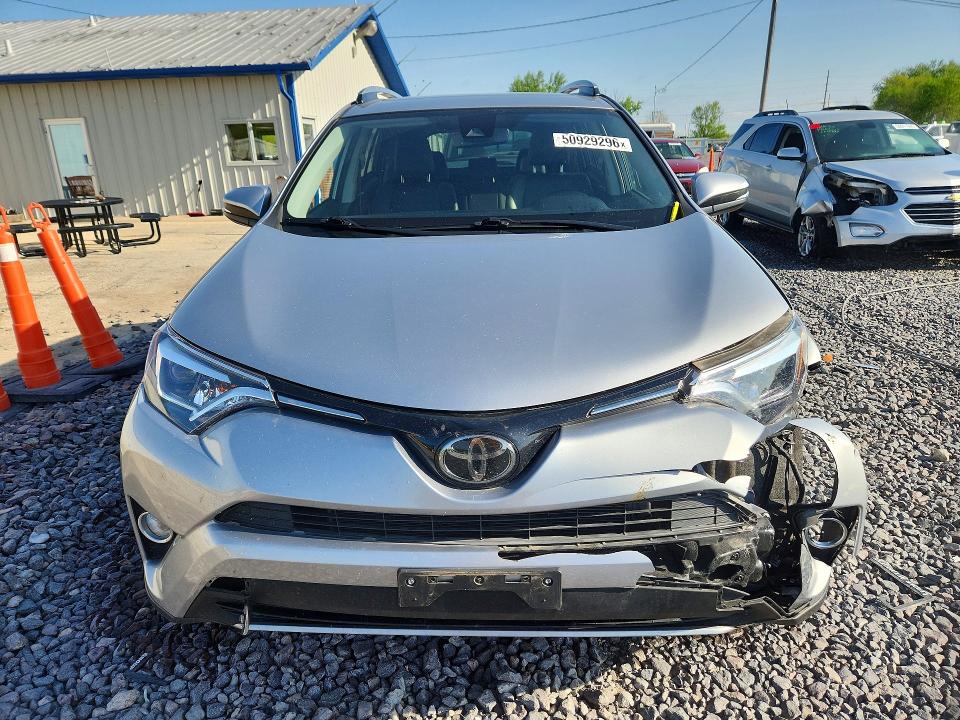 Photo 5 from auction – 2018 TOYOTA RAV4 with VIN JTMDFREV0JJ214362