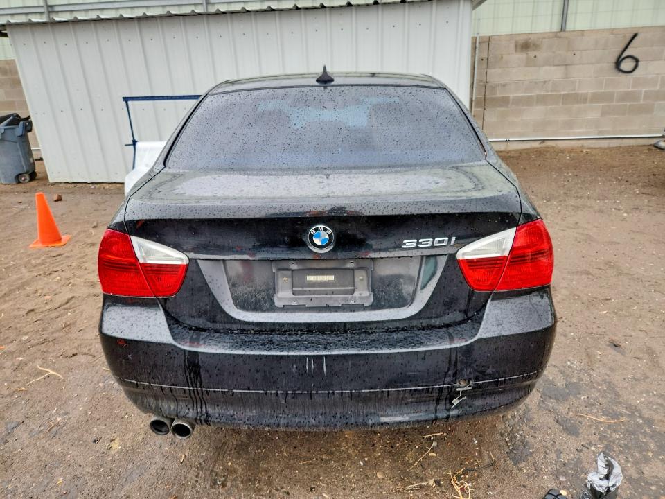 Снимка 6 от търг – 2006 BMW 330I с VIN WBAVB33556KR73426