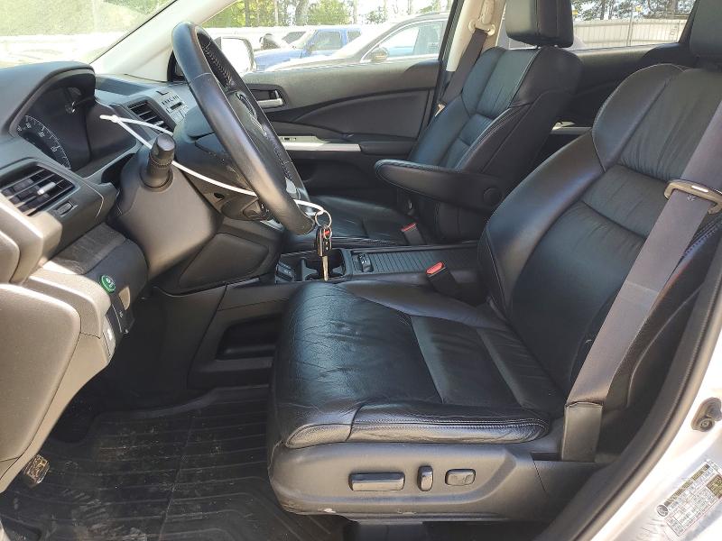 Photo 7 from auction – 2014 HONDA CR-V with VIN 2HKRM3H70EH553028