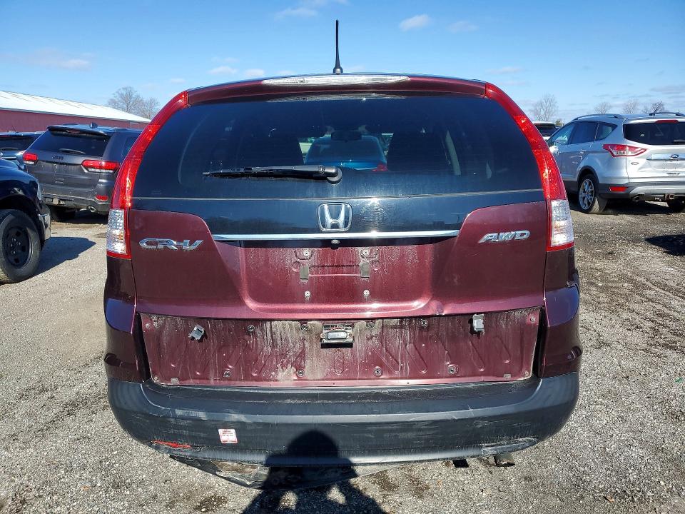 Photo 6 from auction – 2014 HONDA CR-V with VIN 2HKRM4H31EH124404