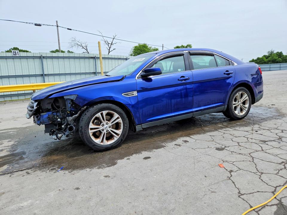 FORD TAURUS 2015 with VIN 1FAHP2E80FG104101 - Photo from auction