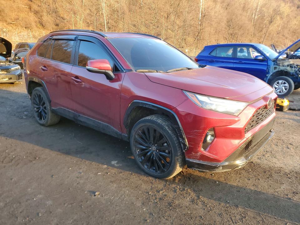 Photo 4 from auction – 2022 TOYOTA RAV4 with VIN JTMA1RFV2ND085156