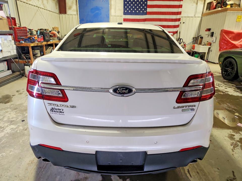 Photo 6 from auction – 2016 FORD TAURUS with VIN 1FAHP2J80GG112450