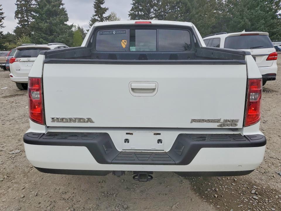 Photo 6 from auction – 2009 HONDA RIDGELINE with VIN 5FPYK16429B101690