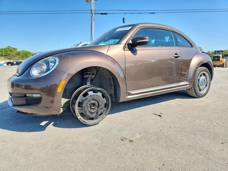 VOLKSWAGEN BEETLE 2013 with VIN 3VWJP7AT0DM631266 - Photo from auction