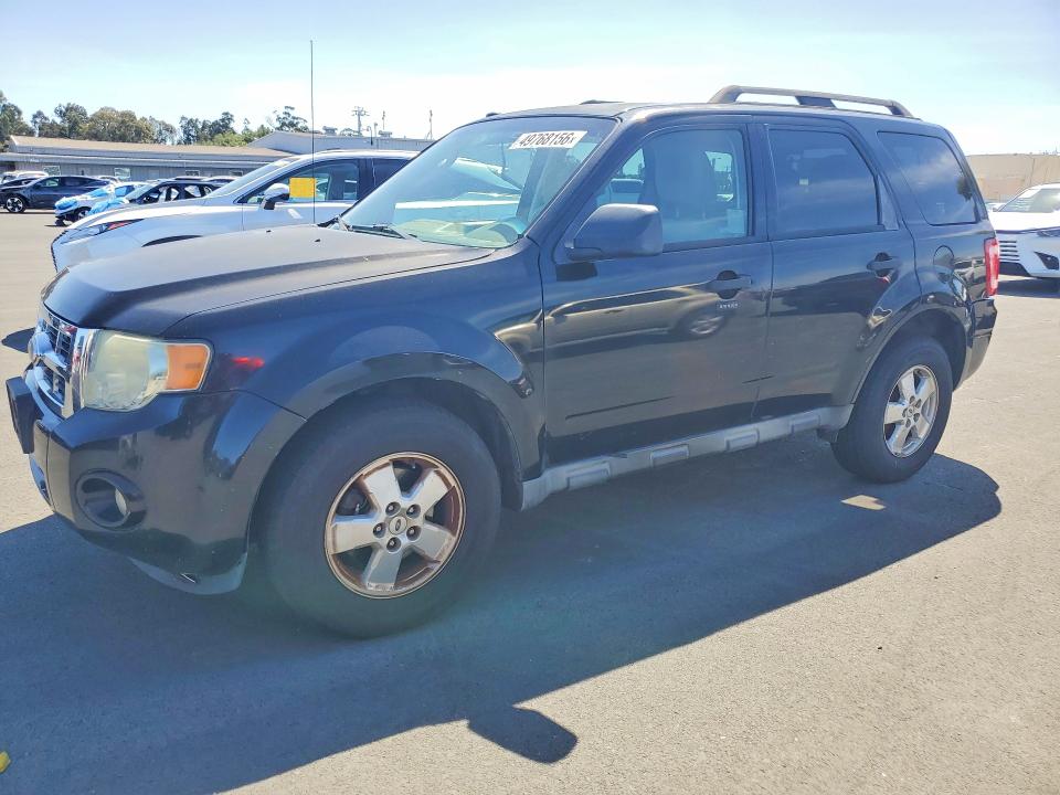 FORD ESCAPE 2011 with VIN 1FMCU9DG9BKA45454 - Photo from auction