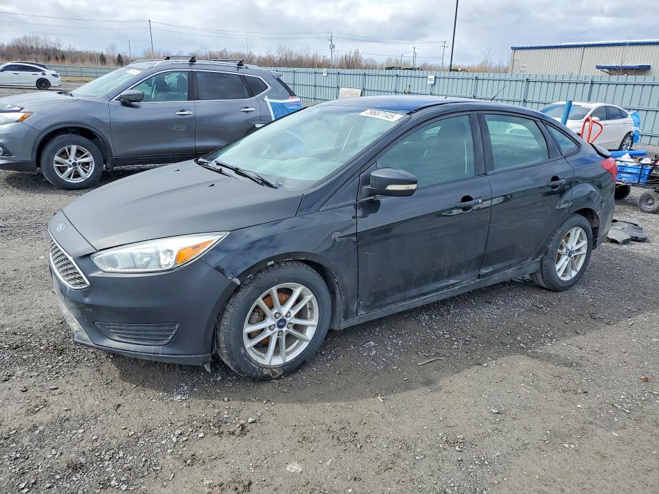 FORD FOCUS 2015 with VIN 1FADP3F29FL296883 - Photo from auction