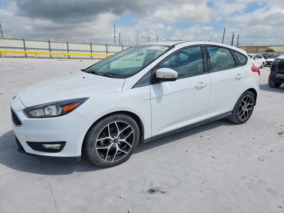 FORD FOCUS 2018 with VIN 1FADP3M26JL241061 - Photo from auction